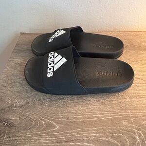 Adidas slides, worn once if ever at all